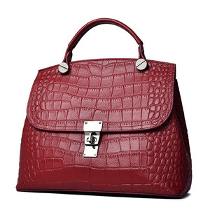 Bolso de mano de cuero genuino a la moda para mujer, de piel de vaca suave, y bolso de hombro con cierre de botón, nuevo bolso de cuero genuino. - Product Image 1
