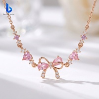 Collier de luxe pour femme en or 14 carats avec pendentif cœur et nœud, serti de diamants de laboratoire, idéal pour les fêtes
