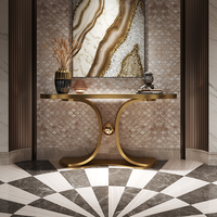 Table console moderne et légère de luxe avec plateau en pierre frittée et base en acier inoxydable doré pour villa, salon et rangement.