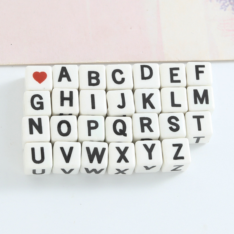 Lettera con foro orizzontale colore misto (1)