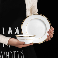 Vajilla de lujo de porcelana de hueso para banquetes de gala; juegos de platos con borde dorado para bodas.