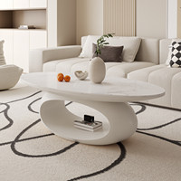 Table basse ovale moderne de luxe léger avec plateau en roche et base en bois massif noir, facile à nettoyer pour le salon.