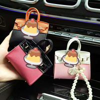 Nouveauté 2026 : Mini porte-sacs de luxe, ornements, porte-monnaie mignon, porte-clés, étui pour écouteurs pour femmes, porte-clés zéro