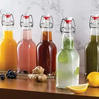 Botella de cerveza abatible de vidrio de 16oz con tapa de sellado superior abatible utilizada para bebidas carbonatadas CommScope té segunda fermentación agua