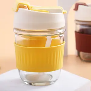 Tasse en verre anti-fuite Offre Spéciale de nouveau Style avec couvercle tasses à thé tasse à café en verre glacé réutilisable transparente avec couvercle en silicone