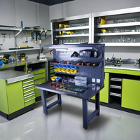 Banco de trabajo de perfil de acero inoxidable multifunción personalizado, mesa de taller electrónica ESD con enchufes y mesa de herramientas móvil