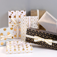 Papier d'emballage cadeau de luxe en feuille d'or épaisse de haute qualité à pois à rayures dessins d'étoiles géométriques estampage à chaud rouleaux d'emballage cadeau de tous les jours