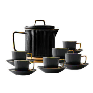 Elegante Juego de Tazas de Té de Porcelana Negra Mate con Diseño de Borde Dorado en Relieve de Estilo Italiano Moderno, 6 Tazas, Ecológico - Product Image 1