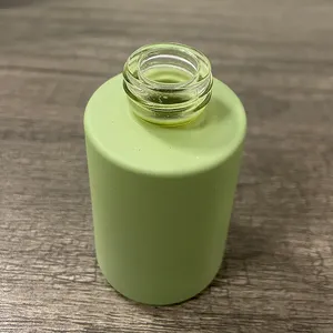 批发30毫升玻璃包装瓶平肩磨砂透明绿色玻璃精油精华瓶带泵