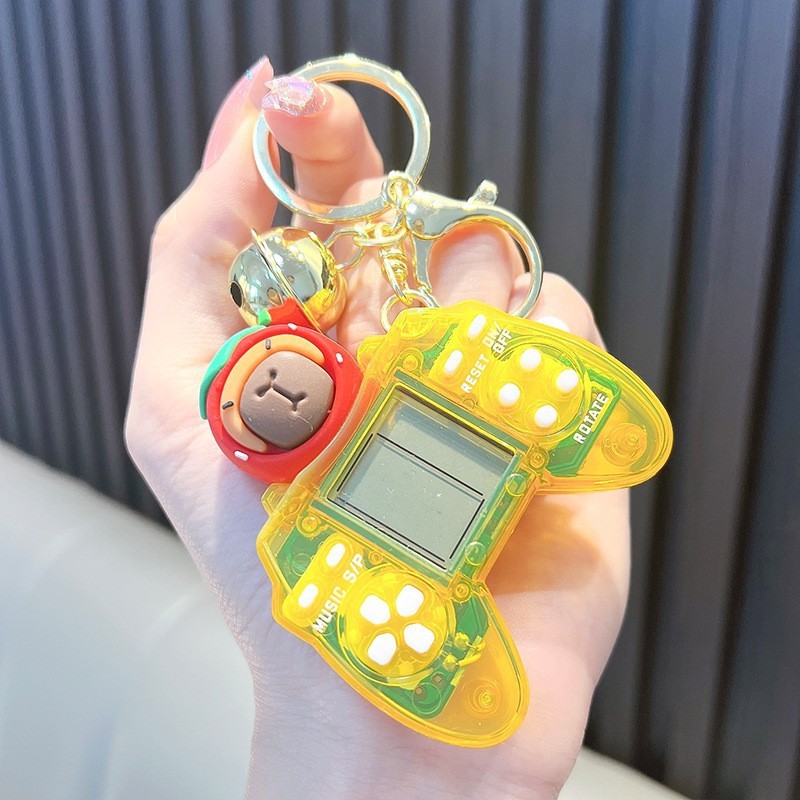 Consola de juegos Capybara con mango transparente-amarillo