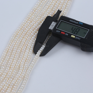 ไข่มุกน้ำจืดทรงกระดุมแบน ขนาด 4.5-5 มม. - Product Image 4