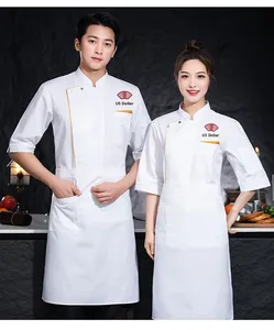 เสื้อโค้ทเชฟบาบีคิวแขนสั้นขอบทองผ้าฝ้ายโพลียูนิเซ็กส์สำหรับร้านบาร์บีคิว | ทนความร้อนปรับแต่งโลโก้ได้ - Product Image 2