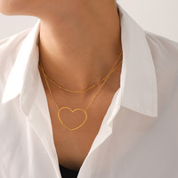 Collier minimaliste léger de luxe en forme de cœur creux en acier inoxydable PVD plaqué or 18K Chaîne de clavicule pour femme