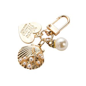 Factory Directly Sales Mini Cute Creative Metal Shell <b>Key</b> <b>Chains</b> for Beach Souvenirs and Bag Pendants and Small Gifts - Product Image 2