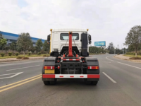 Camion de transport de déchets de construction et de déchets urbains SITRAK G5 8x4 à bras de ramassage manuel haute résistance pour projets d'ingénierie et exportation