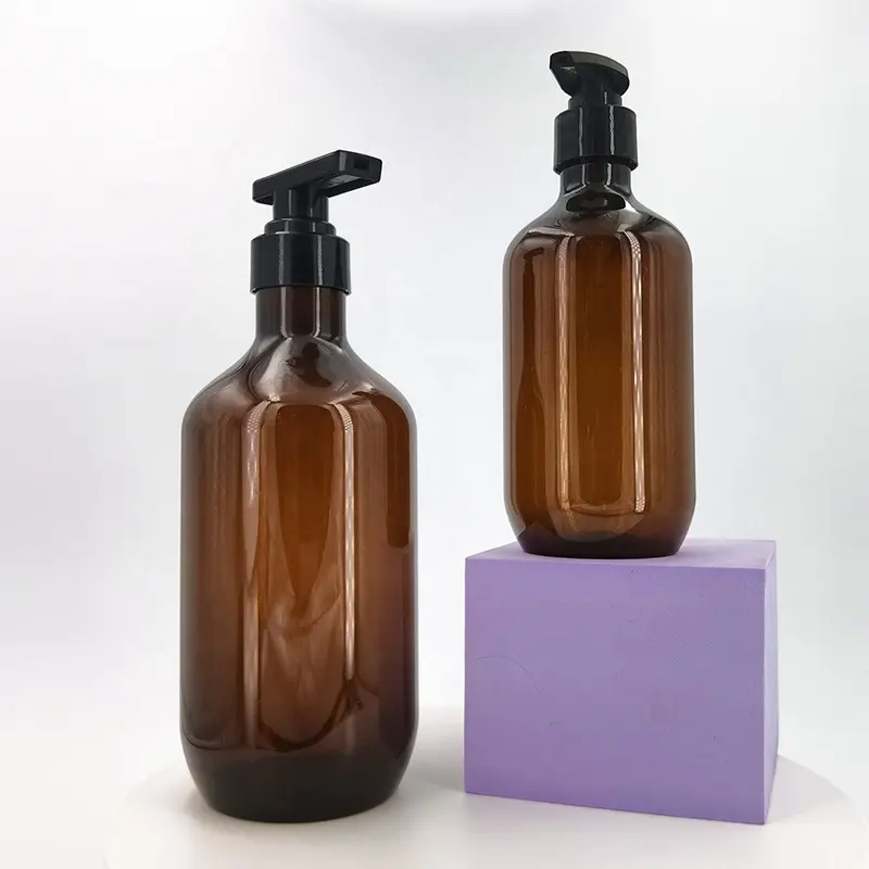 Vendita calda eco-friendly 400ml 750ml PET trasparente in plastica ambra set di bottiglie di lozione per il corpo Shampoo Gel doccia bottiglie con pompa