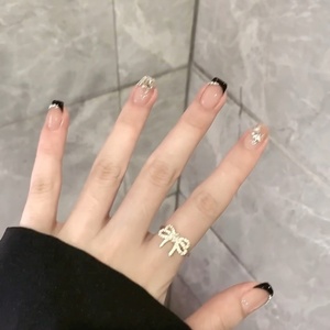 Desgaste de uñas hecho a mano puro, diamantes pequeños franceses negros dulces y frescos, blanqueamiento de alta gama, parches desmontables para estudiantes - Product Image 4