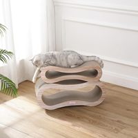 Lit de repos et griffoir pour chat 2-en-1 Infinity en carton moderne de 26 pouces avec herbe à chat pour chats d'intérieur
