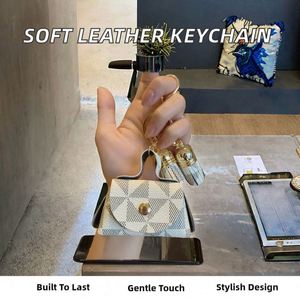 Luxury Durable High Quality Simple Soft Foldable Irregular Shape Keychain Mini Coin Purse Earphone <b>Bag</b> <b>Charm</b> Fashion Leather - Product Image 2