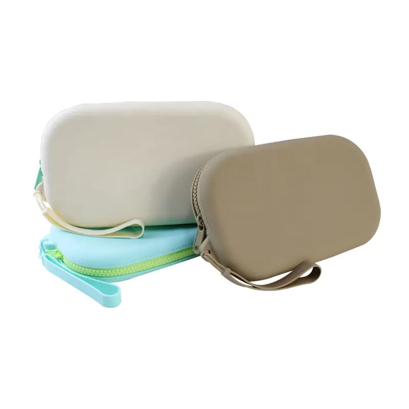 Özel silikon çantası küçük fermuarlı kozmetik çantası su geçirmez seyahat makyaj çantası silikon Oval makyaj çantası