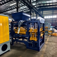Machine automatique hydraulique robuste pour la fabrication de blocs de ciment à faible consommation de main-d'œuvre, équipement de fabrication de briques autobloquantes