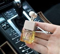 Diffuseur de parfum en verre suspendu de luxe pour voiture, avec couvercle en bois, pour huiles essentielles, vente en gros OEM de haute qualité