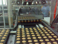 Machine automatique de fabrication de gâteaux en papier