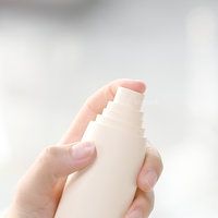 Bouteille en PET recyclable brillante personnalisée de luxe 60ml 80ml 100ml 120ml en forme de capsule pour cosmétiques