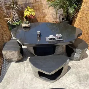 Mesa de comedor de piedra para jardín al aire libre, con bancos y sillas