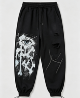 Pantalon baggy streetwear à cordon de serrage, multi-déchirures sur la cuisse, avec imprimé Kornit DTG Drip Splash All Seeing Eye Bone Rhinestone Line