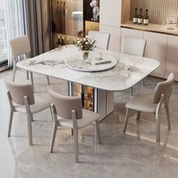 Table à manger extensible commerciale en gros, plateau ovale en pierre frittée avec plateau tournant pour hôtel, restaurant, mobilier de banquet.