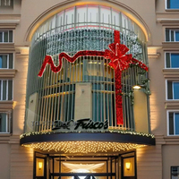 Décoration de Noël géante personnalisable ruban lumineux à motif LED illuminé pour le toit du centre commercial extérieur arc de construction de cadeaux illuminé