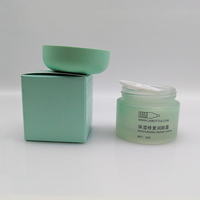 Frasco de envase cosmético vacío de vidrio verde esmerilado personalizado de 15g y 50g para el cuidado de la piel crema para los ojos máscara de plástico suministrado por el fabricante