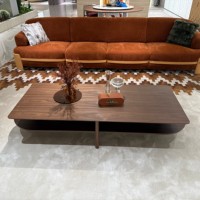 Table basse rectangulaire en bois de luxe avec étagères ouvertes et pieds fins, table centrale moderne en bois foncé pour salon