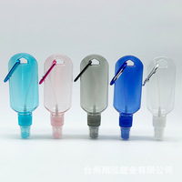 Bouteille de voyage de sport transparente en PETG de 60ml avec bouchon supérieur à rabat Bouteille de désinfectant pour les mains portable sans lavage Anneau Boucle Crochet Conception