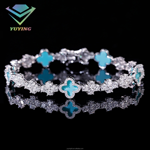 สร้อยข้อมือเทนนิสลายใบโคลเวอร์สี่แฉก ประดับเพชรโมอิสซาไนต์ VVS ชุบทอง เงินแท้ 925 ผ่านการทดสอบเพชร ได้รับการรับรองจาก GRA - Product Image 2