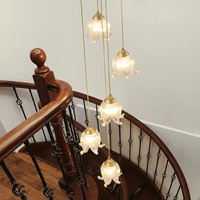 Lustre en cuivre et cristal multi-têtes pour salle à manger et bar, suspension en verre exquise pour café et salon à plafond haut