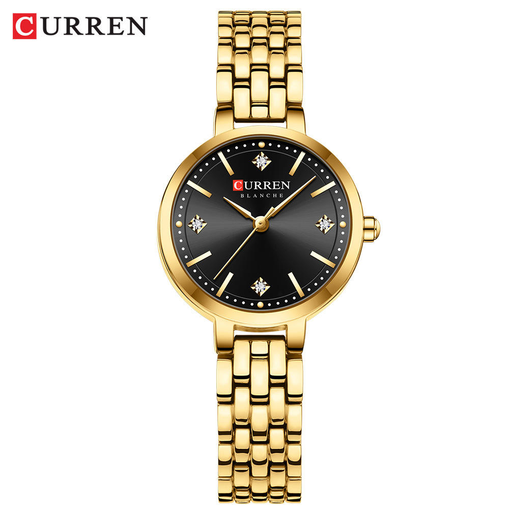 Black dial gold strap