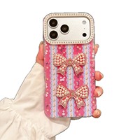 Coque de téléphone rigide magnétique en TPU mat effet premium avec strass en forme de cœur et nœud, ornée de perles de style nouveau pour iPhone 18