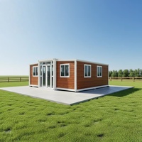 Maison Modulaire Conteneurisée de Haute Qualité 1 Pièce 2 Chambres Maison Capsule Toit Plat Extensible Maison Préfabriquée Maison Démontable