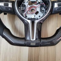 Accessoires de voiture de haute qualité volant en cuir de Fiber de carbone véritable adapté pour volant de voiture BMW F01 F02