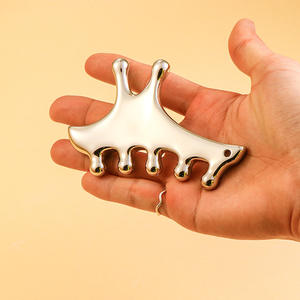 Massaggiatore Kinwong in Metallo 4-in-1 per Terapia Meridiana, Raschietto per Naso a Forma di Lumaca, Massaggiatore per Muscoli, Tendini e Punti di Agopuntura - Product Image 1