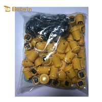 Vente directe d'usine Bouton poussoir en plastique durable de 24 mm pour machine à griffes