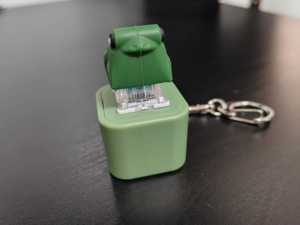 Xu hướng mới có thể sạc lại croak ếch Mặt dây chuyền Keychain âm thanh ánh sáng chức năng tùy chỉnh nhựa Keycaps Đồ chơi trục Tester Keychain - Product Image 3