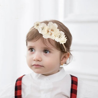 Diadema elástica suave con flores para bebé, lazos de perlas y diamantes de imitación, accesorios de lujo al por mayor para el cabello de bebés, diadema para niñas recién nacidas