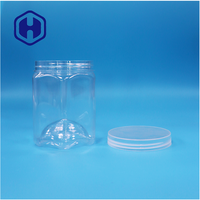 Pot en plastique PET hexagonal unique de 540 ml de qualité alimentaire avec couvercle à vis anti-fuite sans BPA, fond ondulé, pour le stockage de collations, de bonbons, de sucre