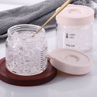 Bouteilles d'eau en verre de luxe, bocaux en verre personnalisés 75ml 250ml 500ml avec couvercle en silicone coloré et hermétique pour usage domestique OEM ODM