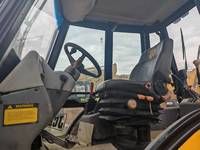 Chargeuse-pelleteuse d'occasion JCB 4CX en bon état