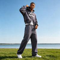 Ensemble survêtement homme personnalisé avec sweat à capuche double fermeture éclair et pantalon de survêtement en molleton épais de coton, imprimé sérigraphié, coupe oversize, vente en gros