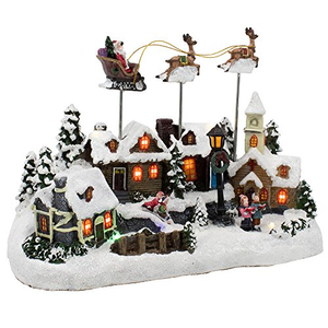 Grande maison de Noël musicale en polyrésine avec scène de traîneau du Père Noël volant, village de Noël avec arbre de Noël rotatif - Product Image 1